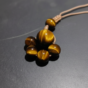 Hand-woven golden tiger's eye five-star charm with cat's eye effect and premium bronze cord by PICKLNN