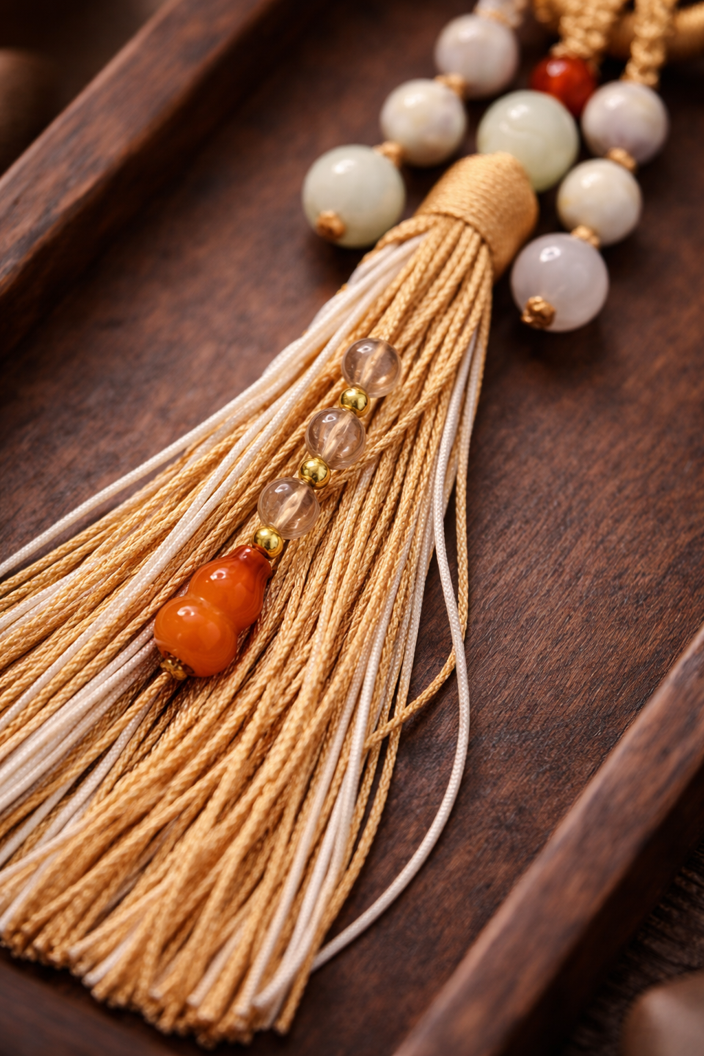 close up of hand knotted tassel using no 72 jade cord