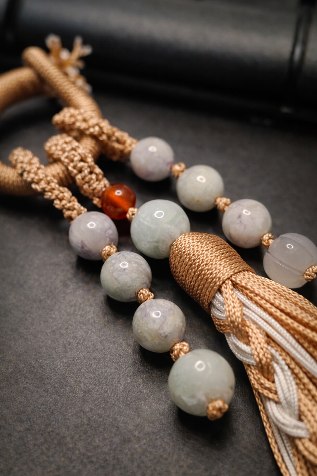 grade a jadeite bead detail on handmade tassel pendant