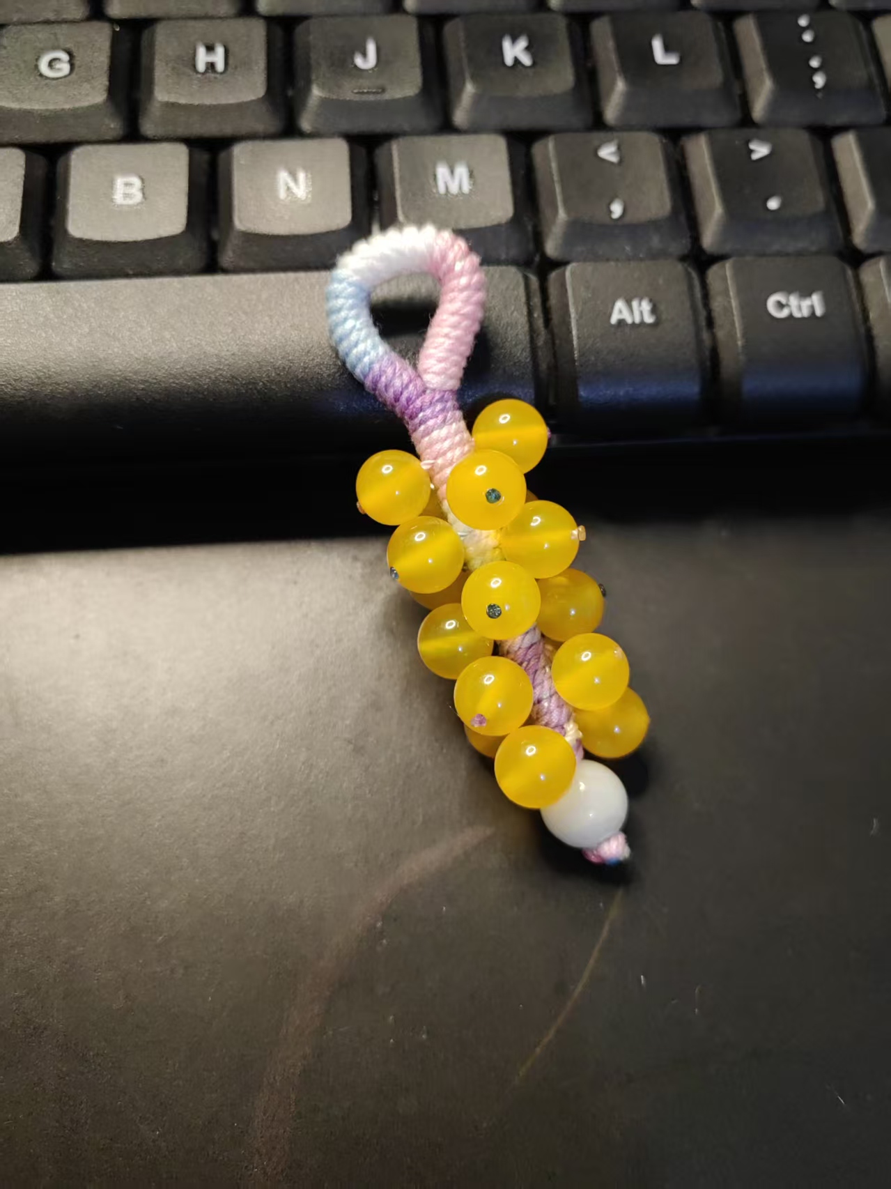 handmade tassel pendant detail with natural 0.8mm beads