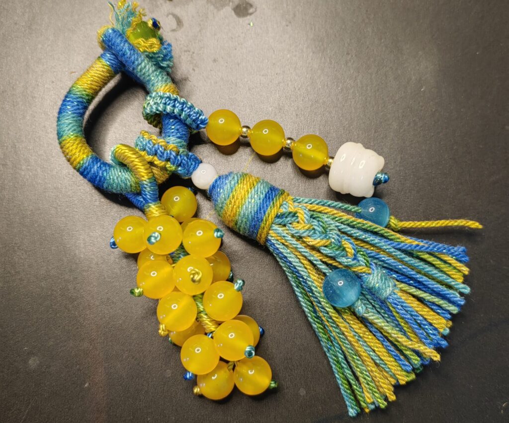 close up of hand knotted tassel using 1.0mm jade cord