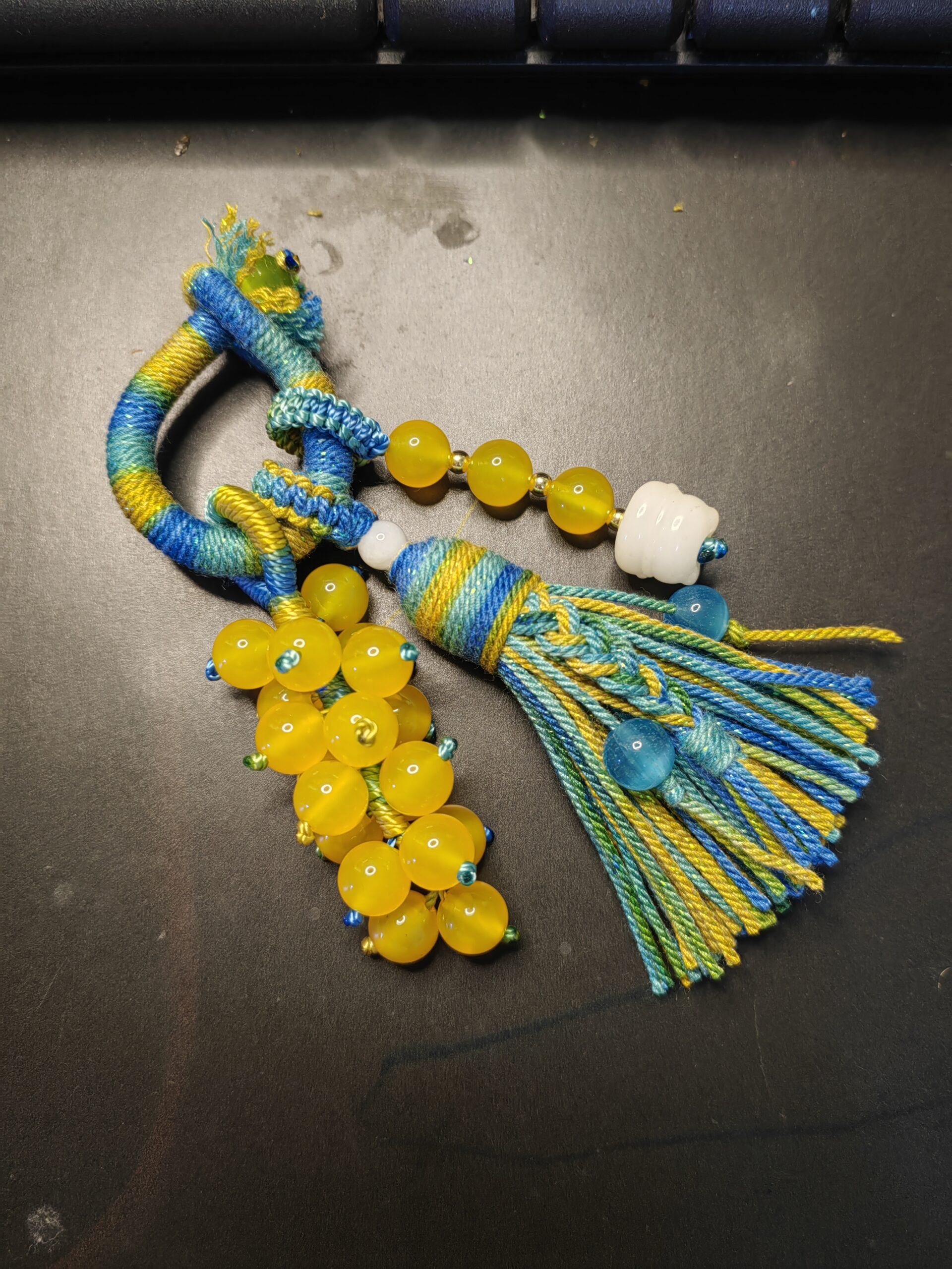 close up of hand knotted tassel using 1.0mm jade cord