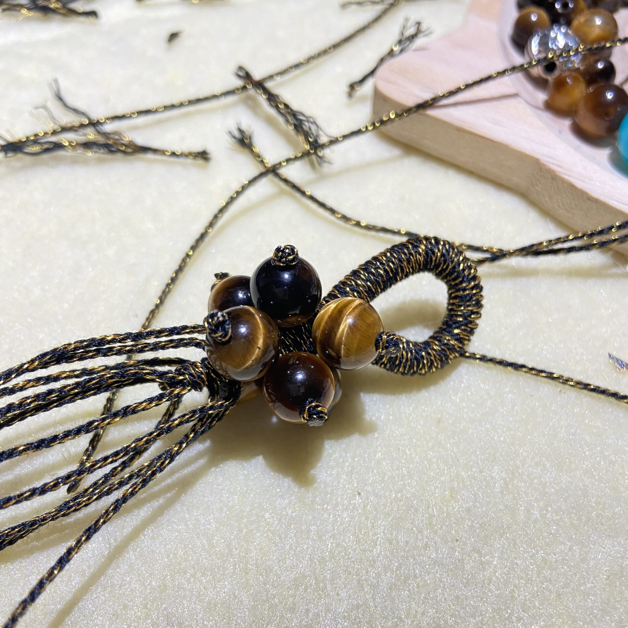 natural wood and tiger eye bead charm