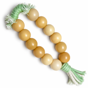 21mm bodhi handheld fidget with honey-colored beads and green-and-cream tassels