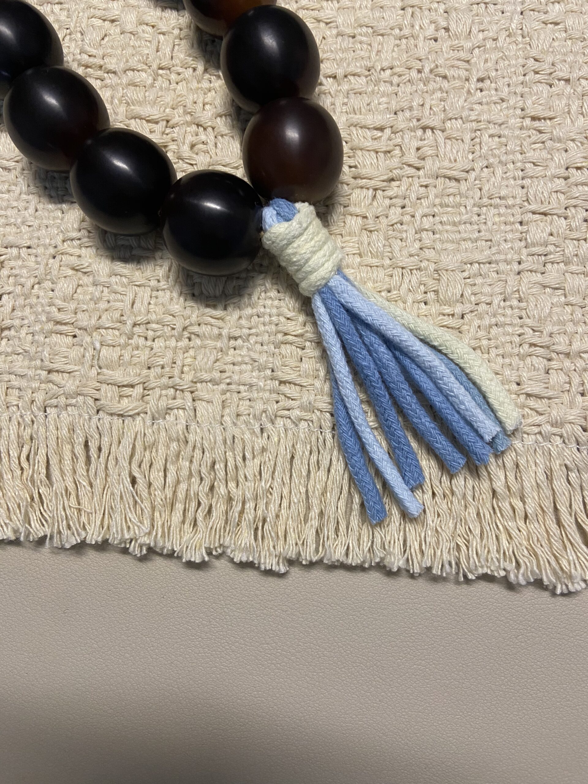 20mm Natural Bodhi Handheld Fidget – Dark Natural Beads with Blue Tassel 2 natural 20mm Bodhi handheld worry beads close-up