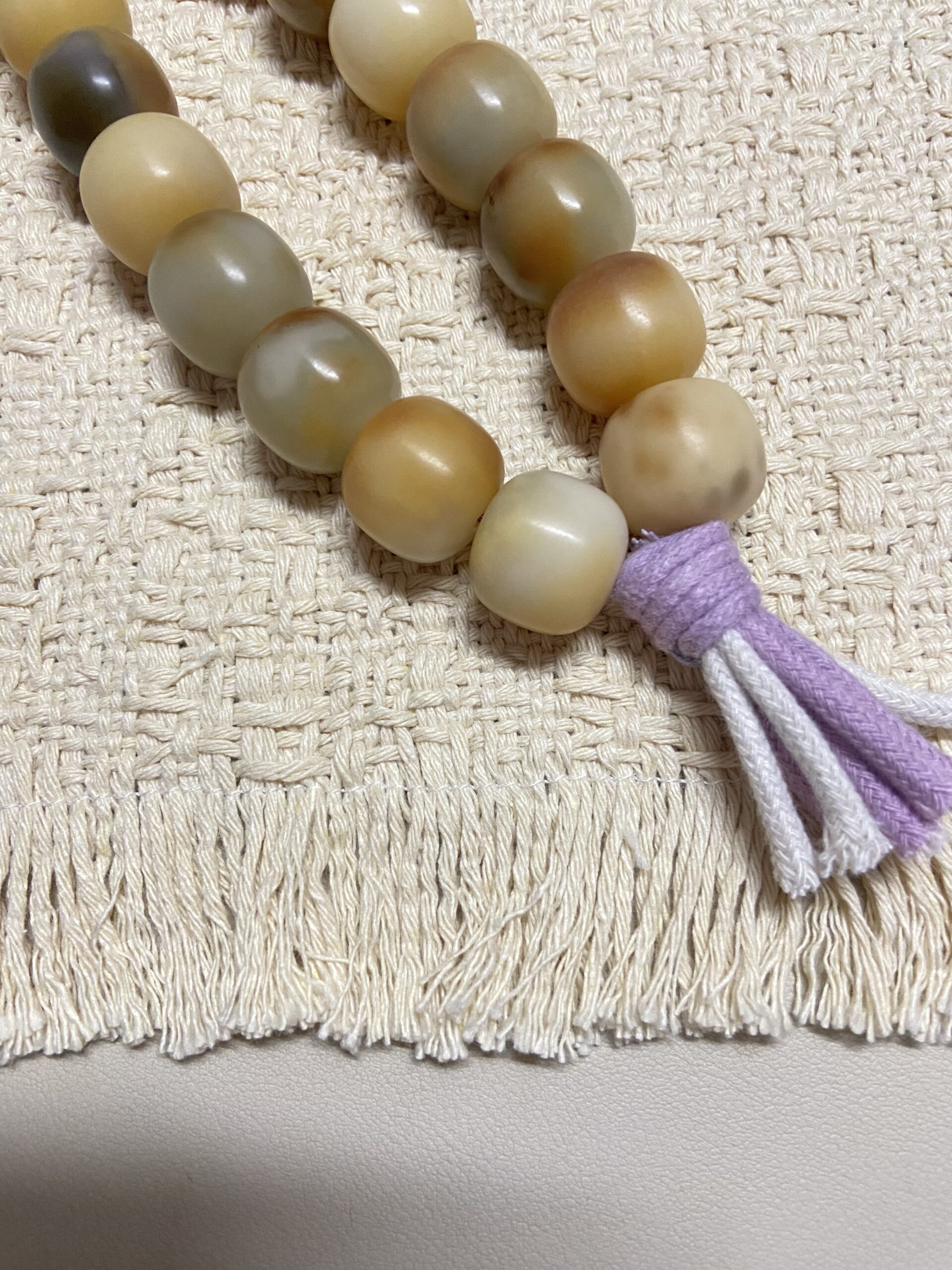 18mm Natural Bodhi Handheld Fidget – purple and cream tassels 3 18mm natural Bodhi handheld fidget beads purple cream