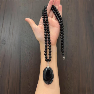 Oversized obsidian pendant